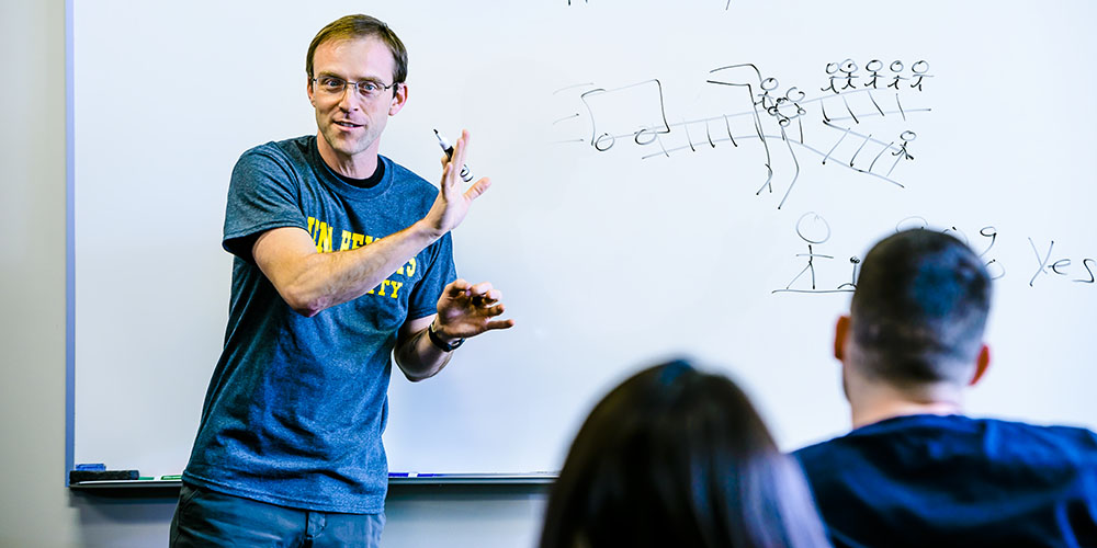 speaker doing a speech in an LCC classroom