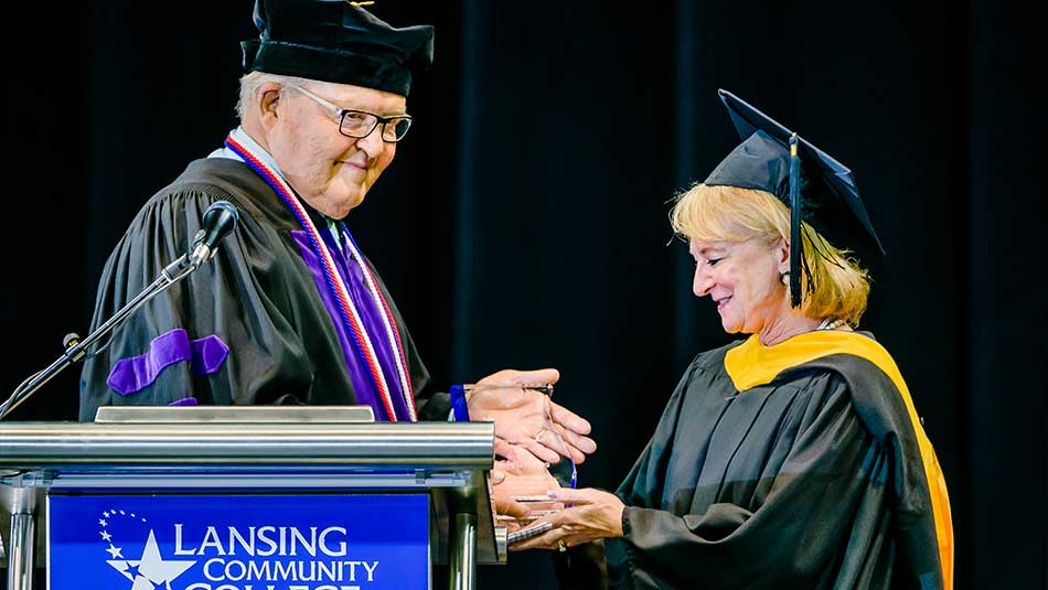 Penny Wirsing receiving an award at Commencement