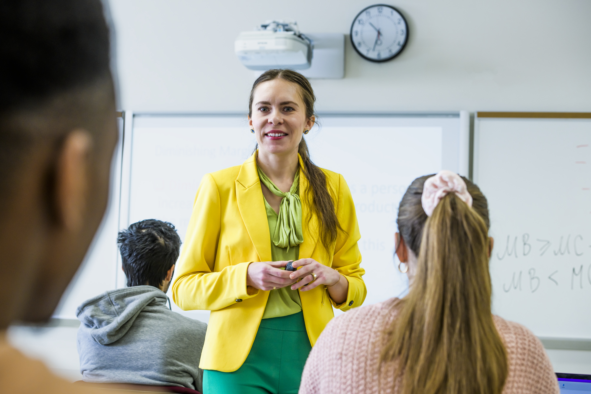 Woman in yellow sweater