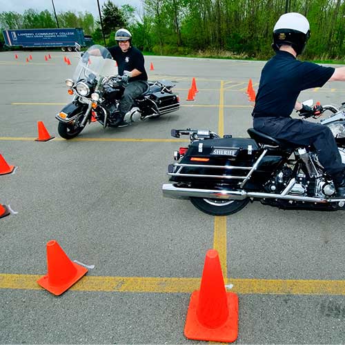 Riding motorcycles within cones