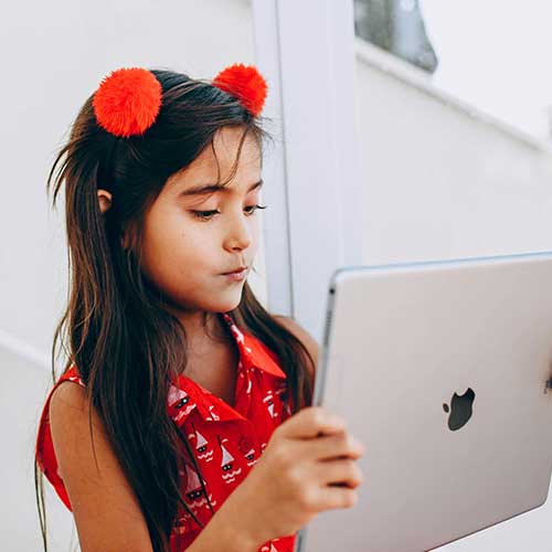 Student holding an iPad