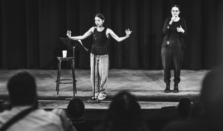 a student performing on a stage