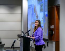 Presenter at the front of the room