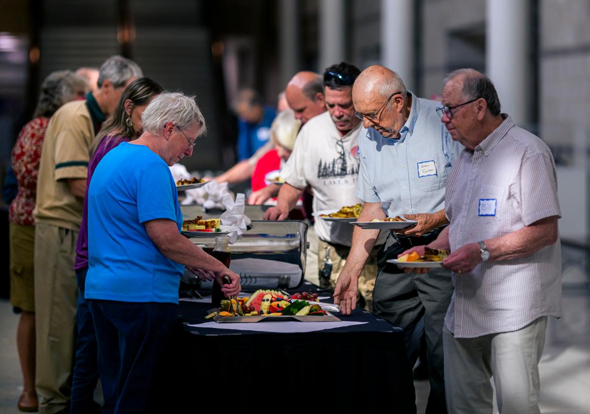 People standing in line for food