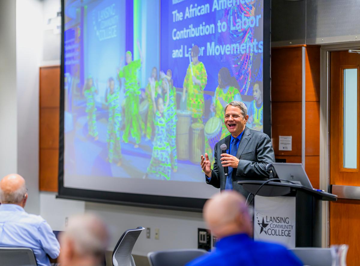 Presenter at the front of the room