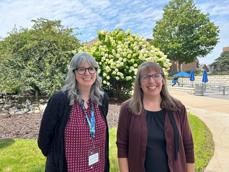 amy park standing with andrea hoagland on campus