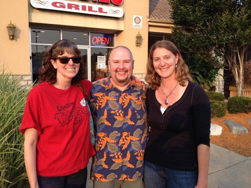 amy park out front of a restaurant with tony yuhasz and laurie kinne