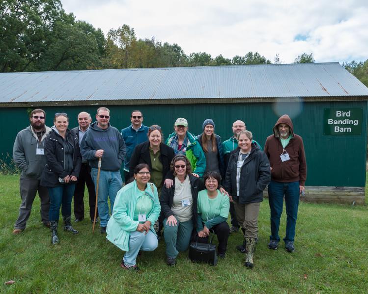 Erica Staton with a group of people posing for a photo