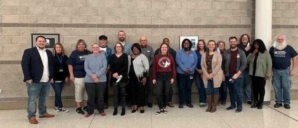 Eva Menefee with a large group