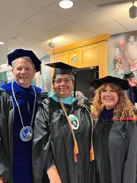 Eva Menefee at graduation with the LCC President