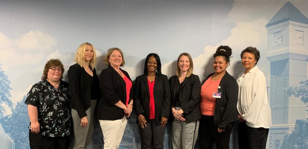 Evelyn Lynn with other team members in 2021