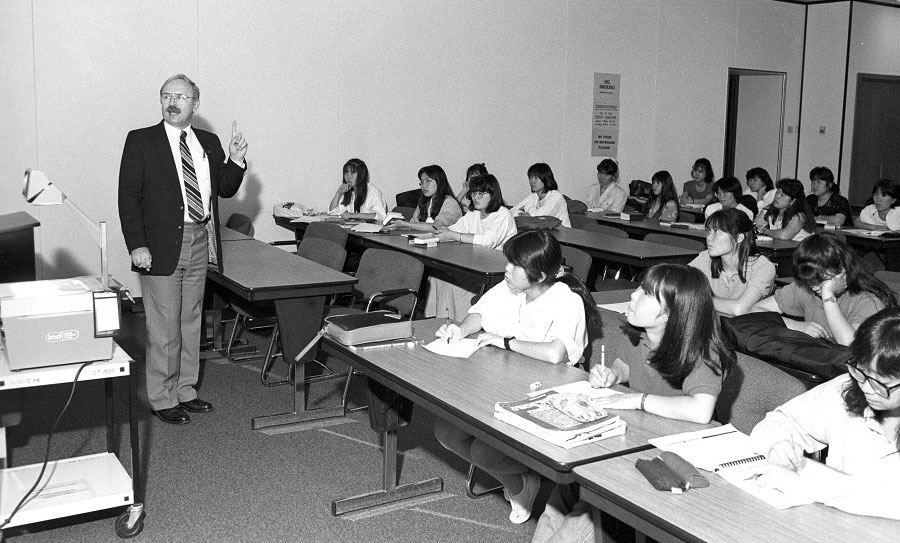 LCC Faculty member Bill Motz speaks to students from Japan during a summer program at LCC hosted by LCC’s International Programs Office - ca. 1990s