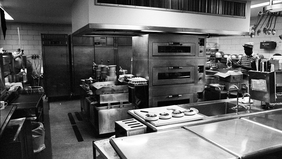 Students work in the Culinary Arts Kitchen in the Arts and Sciences Building - ca. 1980s