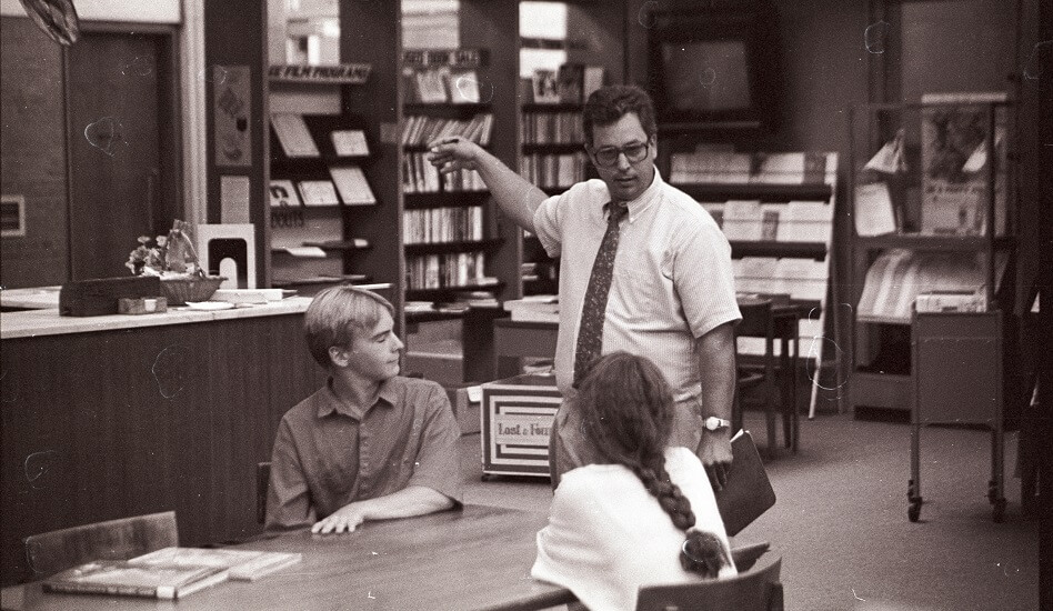 Volunteers take part in the filming of a multi-district hostage training scenario video shot by LCC staff members at the East Lansing Public Library - ca. 1980s.