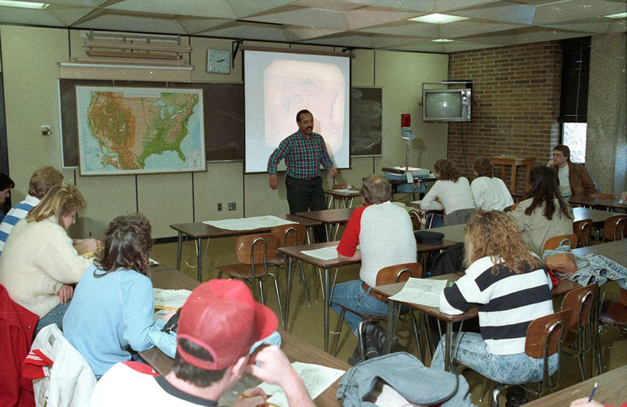 Morris Thomas teaches a Geography class in the Arts & Sciences Building - ca. 1980s