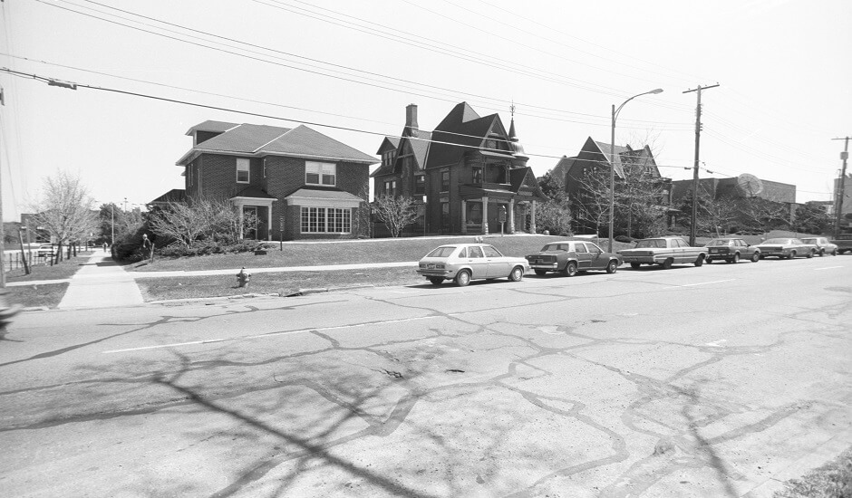 LCC buildings along Capitol Avenue, from left: North House, Rogers-Carrier House, Herrmann House, and the Dart Auditorium - ca. 1987-2003.