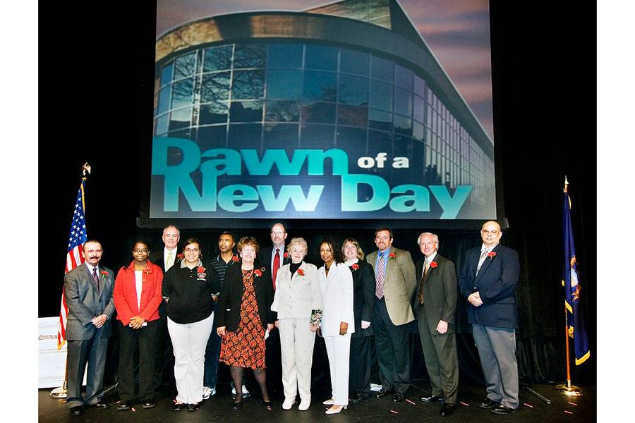 President Paula Cunningham (5th from the right) standing with LCC staff, students, trustees and community members at the opening event for the Human Health and Public Services Building (now called the Health and Human Services Building) - October 2005.