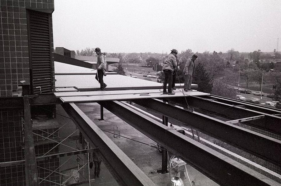 Workers adding on to the east side of the Gannon Vocational-Technical Center portion of the Gannon Building - ca. 1980s