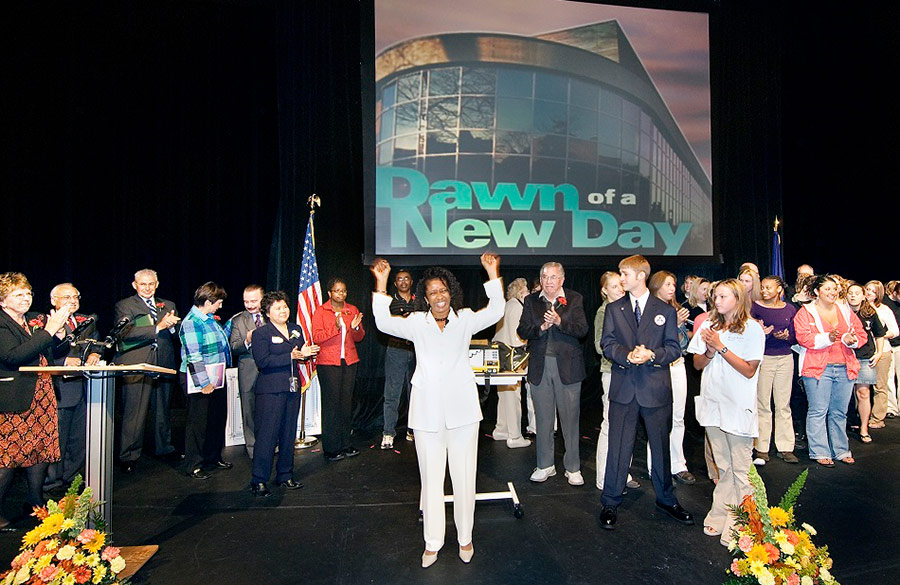 President Cunningham cheers at the opening ceremony event for the Health & Human Services Building on the downtown campus - October 2005.