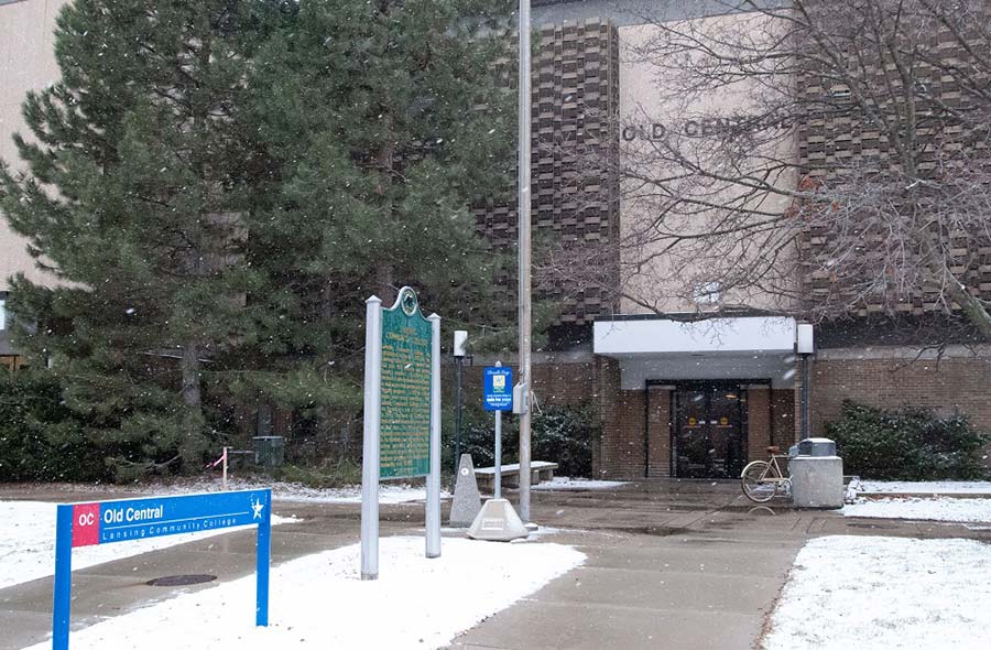 The entrance of the Old Central building in March 2006. The Michigan Historical Site sign was moved to the front of the Administration Building when Old Central was demolished.