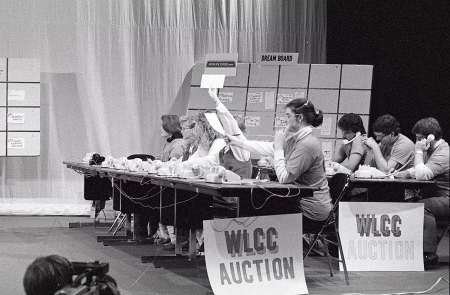 Volunteers man the phones at the fundraising auction for WLCC Radio televised from Dart Auditorium in 1988.