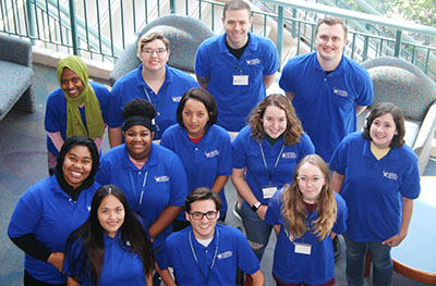 the library's student staff posing for a team photo