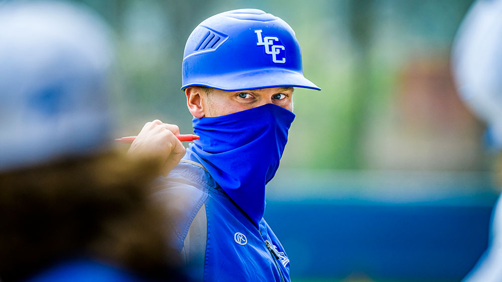 baseball coach's masked face up close