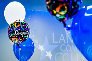 LCC balloons that say Congrats