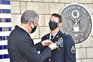 LCC Nursing student and Army Staff Sergeant Jacob Showerman receiving his nursing pin