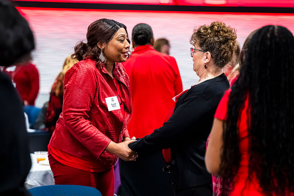 Equal Pay Day Breakfast-attendees greeting